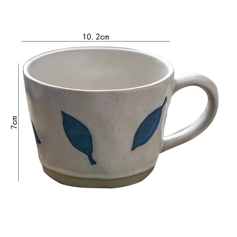 Blue Leafy Craft Style Irregular Shaped Ceramic Mug With Exposed Base