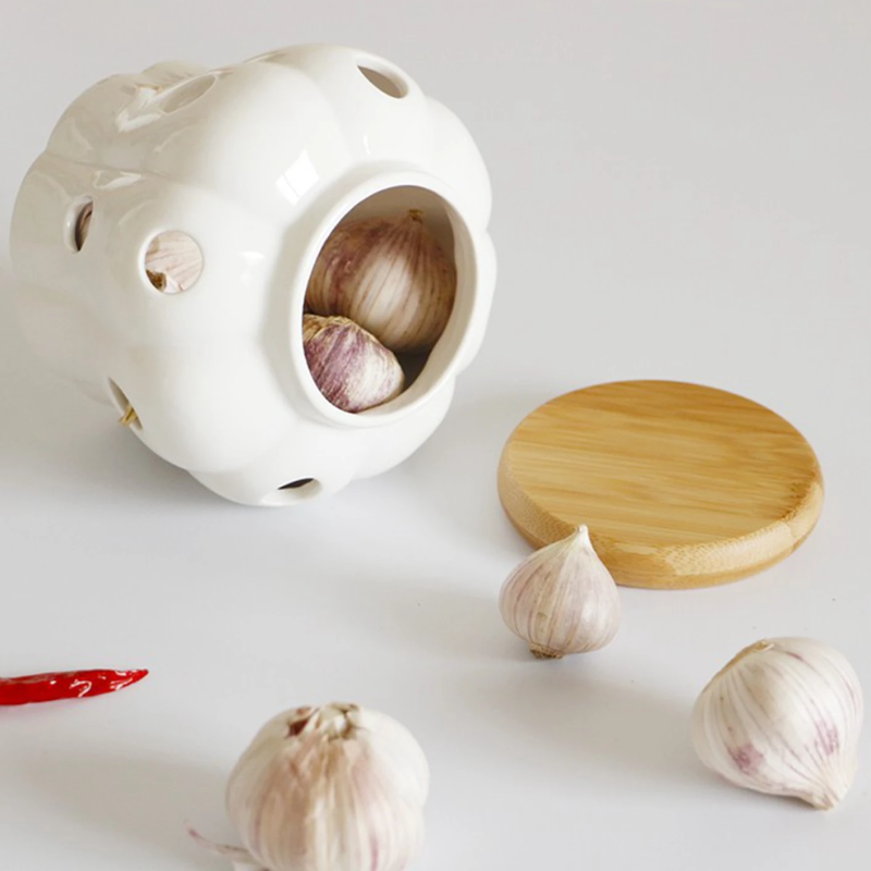 Ivory Ceramic Garlic Pot With Bamboo Lid To Store Fresh Garlic In The Kitchen