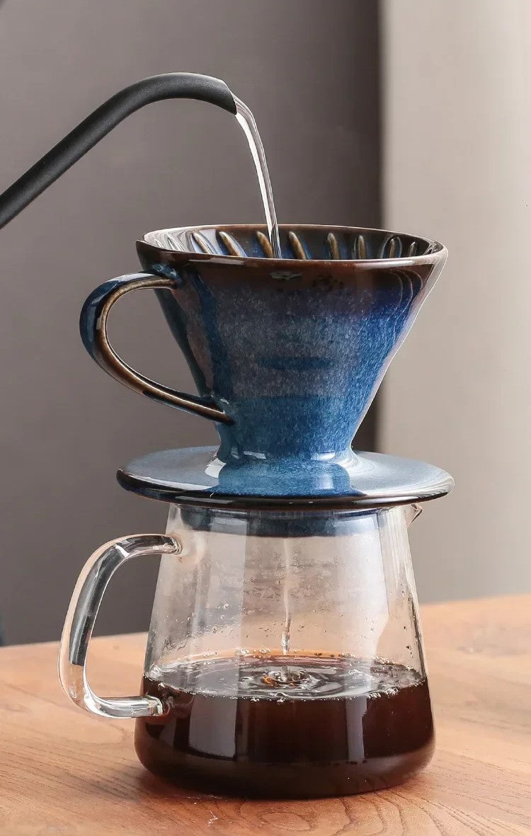 Making Pour Over Style Coffee With Gooseneck Kettle Ceramic Coffee Cone And Glass Pot Barista Gear