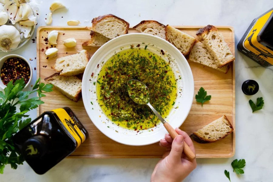 Bread With Fresh Garlic And Herb Olive Oil Dip Made With Terra Delyssa Organic Oil