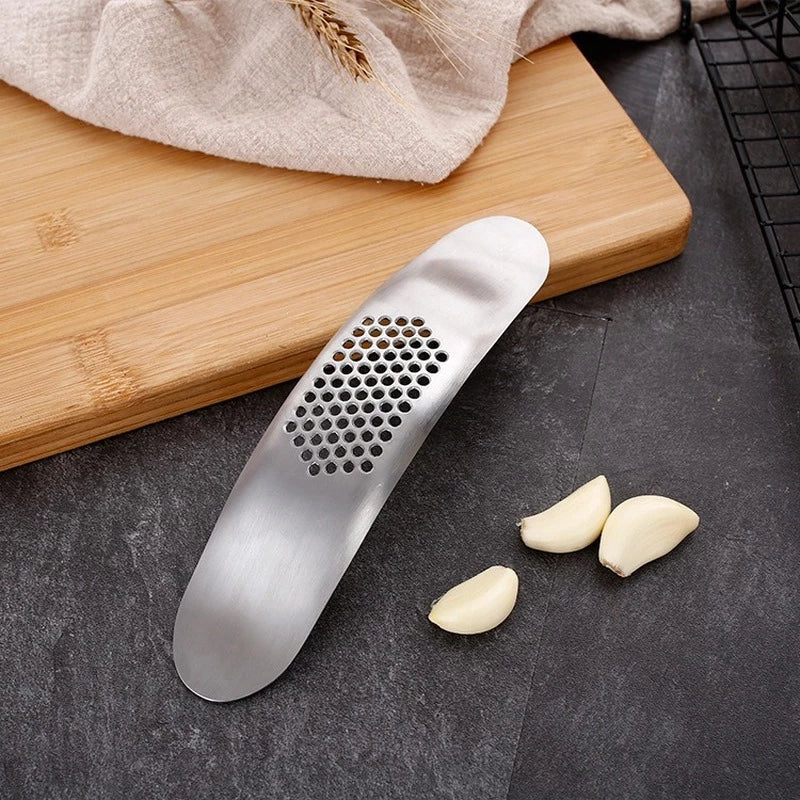 Bamboo Cutting Board Fresh Garlic Cloves And Bottom Design Of Easy To Use Garlic Press