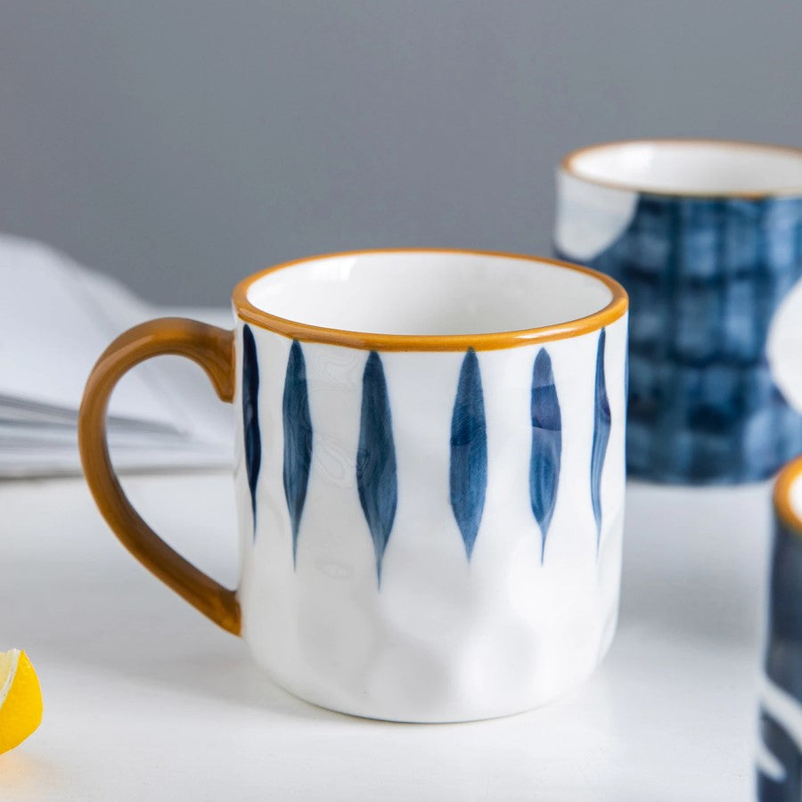 Pier Mug With Other Ceramic Cups In Nautical Style Prints